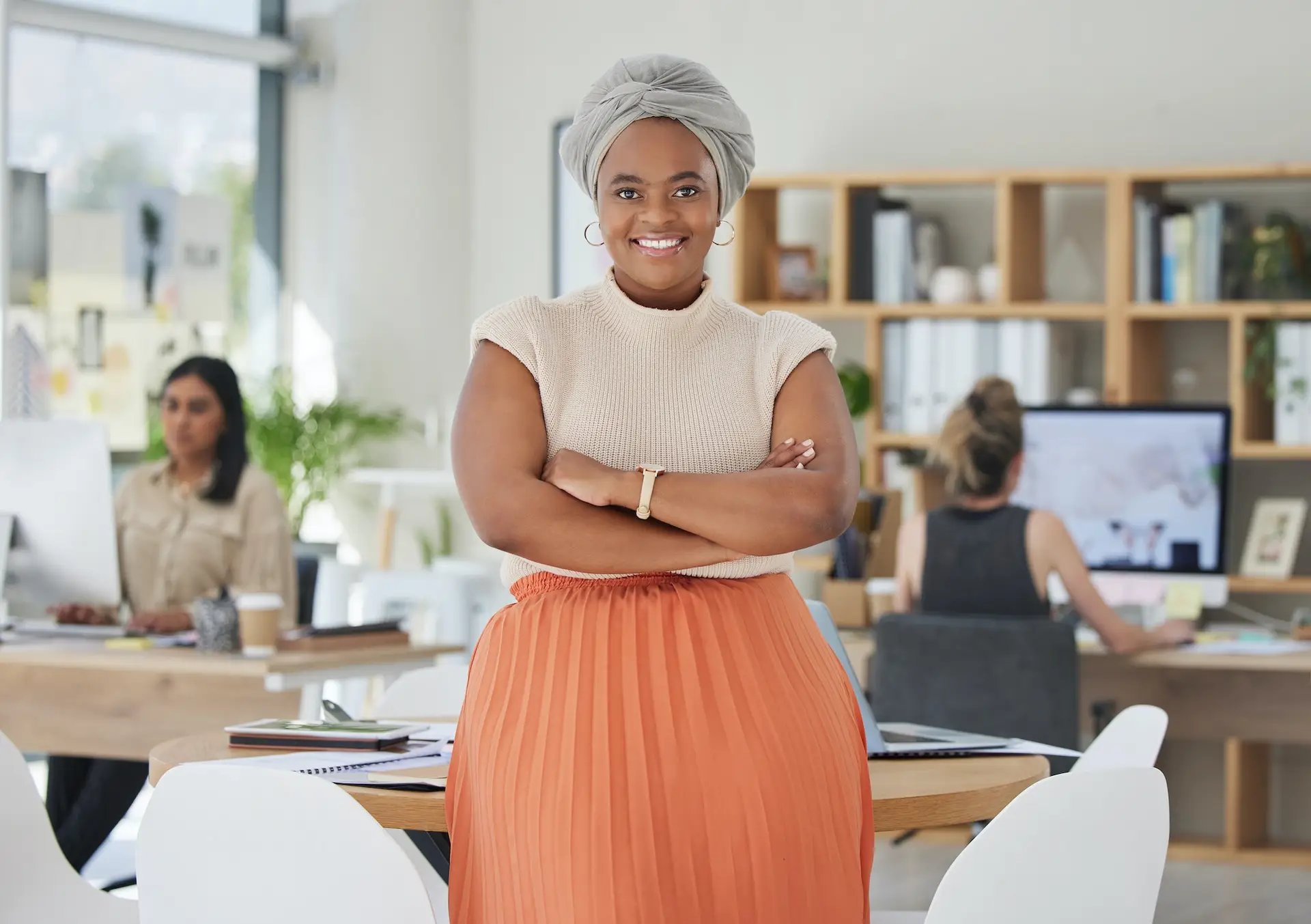 Innovation, leadership and a proud black business woman standing in power in a corporate office. Ha